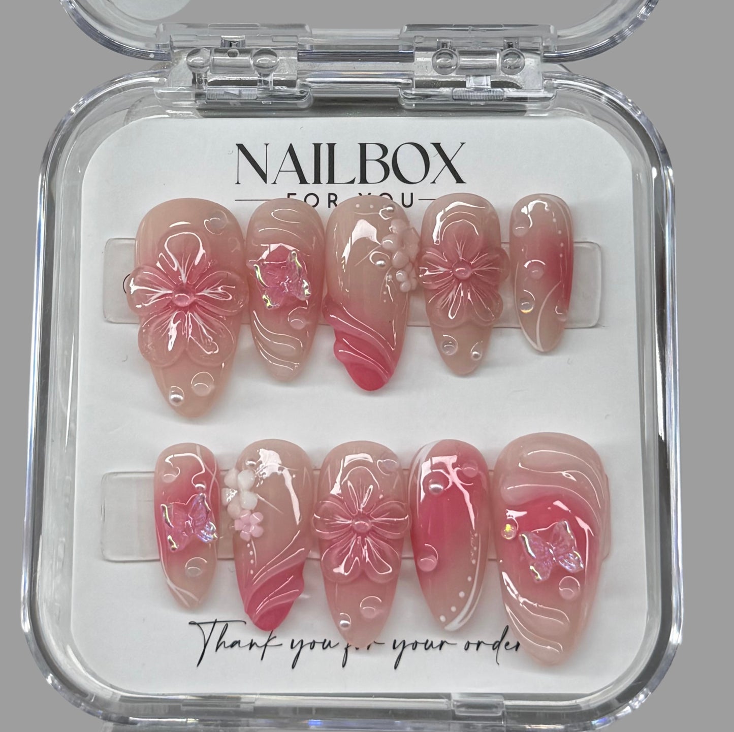 Set of pink floral nail art designs 